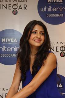 Anushka Sharma gestures during the launch of Nivea’s Go Sleeveless Campaign in Mumbai