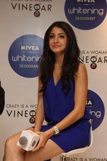 Anushka Sharma gestures during the launch of Nivea’s Go Sleeveless Campaign in Mumbai
