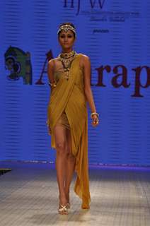 Nargis Fakhri & Abhay Deol walks the ramp for Amrapali Jewellers at IIJW 2012