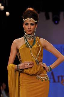 Nargis Fakhri & Abhay Deol walks the ramp for Amrapali Jewellers at IIJW 2012