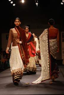Models walk on the ramp for designer Manish Malhotra Wills Lifestyle India Fashion Week 2013 in New Delhi. (Photo: IANS/Amlan)