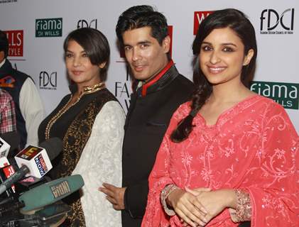 Models walk on the ramp for designer Manish Malhotra and Bollywood actress Shabana Azmi and Parineeti Chopra Wills Lifestyle India Fashion Week 2013 in New Delhi. (Photo: IANS/Amlan)