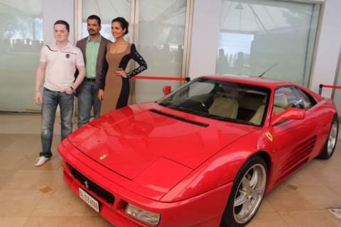 Keertan Adyanthaya, MD, National Geographic Network, Gautam Singhania Chairman of India's Super Car Club and bollywood actress Esha Gupta during a National Geographic Channel  Supercars launch at Blue Sea in Mumbai.