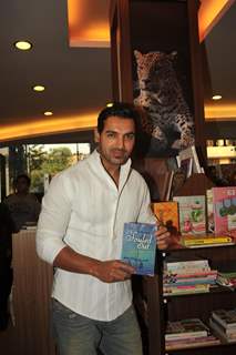 John Abraham unveiling the book of Ayushmann Khurrana Souled Out