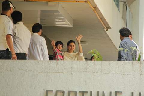 Karishma Kapoor at Saif Ali Khan with wife Kareena Kapoor gestures after their marriage