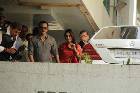 Saif Ali Khan with wife Kareena Kapoor gestures after their marriage