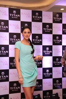 Bollywood actress Nargis Fakhri unveiling of the exquisite Raga Cities Collection of watches by Titan at World of Titan store in Bandra, Mumbai.