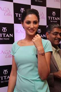 Bollywood actress Nargis Fakhri unveiling of the exquisite Raga Cities Collection of watches by Titan at World of Titan store in Bandra, Mumbai.