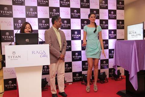 Bollywood actress Nargis Fakhri with Mr Ajoy Chawla,Vice president,Titan unveiling of the exquisite Raga Cities Collection of watches by Titan at World of Titan store in Bandra, Mumbai.