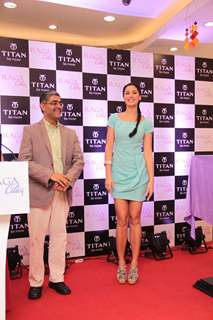 Bollywood actress Nargis Fakhri with Mr Ajoy Chawla,Vice president,Titan unveiling of the exquisite Raga Cities Collection of watches by Titan at World of Titan store in Bandra, Mumbai.