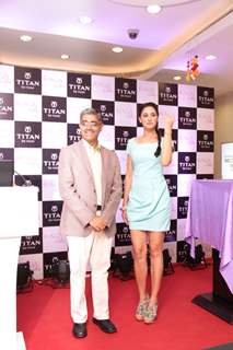 Bollywood actress Nargis Fakhri with Mr Ajoy Chawla,Vice president,Titan unveiling of the exquisite Raga Cities Collection of watches by Titan at World of Titan store in Bandra, Mumbai.