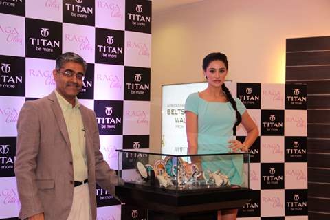 Bollywood actress Nargis Fakhri with Mr Ajoy Chawla,Vice president,Titan unveiling of the exquisite Raga Cities Collection of watches by Titan at World of Titan store in Bandra, Mumbai.
