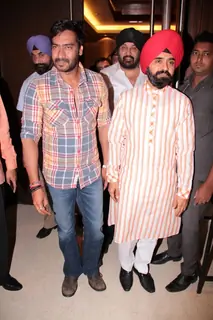 Bollywood actor Ajay Devgan and Congress leader Charan Singh Sapra at Son Of Sardaar press meet to resolve issues with Sikh Community leaders at Hotel Novotel in Juhu, Mumbai.