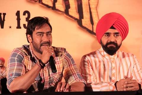 Bollywood actor Ajay Devgan and Congress leader Charan Singh Sapra at Son Of Sardaar press meet to resolve issues with Sikh Community leaders at Hotel Novotel in Juhu, Mumbai.