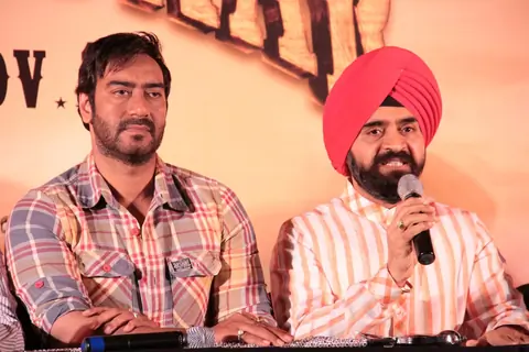 Bollywood actor Ajay Devgan and Congress leader Charan Singh Sapra at Son Of Sardaar press meet to resolve issues with Sikh Community leaders at Hotel Novotel in Juhu, Mumbai.
