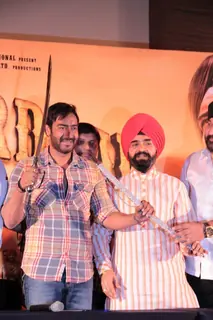 Bollywood actor Ajay Devgan and Congress leader Charan Singh Sapra at Son Of Sardaar press meet to resolve issues with Sikh Community leaders at Hotel Novotel in Juhu, Mumbai.