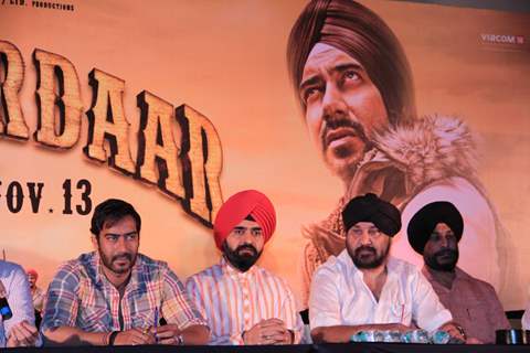 Bollywood actor Ajay Devgan and Congress leader Charan Singh Sapra at Son Of Sardaar press meet to resolve issues with Sikh Community leaders at Hotel Novotel in Juhu, Mumbai.