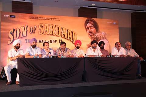 Bollywood actor Ajay Devgan and Congress leader Charan Singh Sapra at Son Of Sardaar press meet to resolve issues with Sikh Community leaders at Hotel Novotel in Juhu, Mumbai.