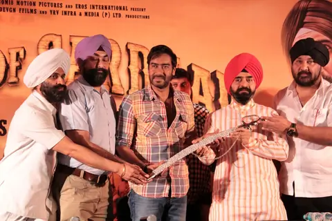 Bollywood actor Ajay Devgan with Congress leader Charan Singh Sapra and other members of Punjabi Cultural Heritage Board (PCHB) at Son Of Sardaar press meet to resolve issues with Sikh Community leaders at Hotel Novotel in Juhu, Mumbai.