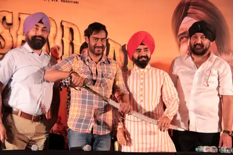 Bollywood actor Ajay Devgan with Congress leader Charan Singh Sapra and other members of Punjabi Cultural Heritage Board (PCHB) at Son Of Sardaar press meet to resolve issues with Sikh Community leaders at Hotel Novotel in Juhu, Mumbai.