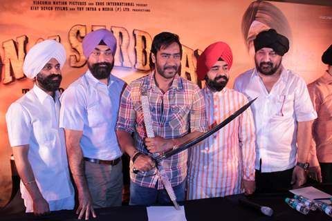 Bollywood actor Ajay Devgan with Congress leader Charan Singh Sapra and other members of Punjabi Cultural Heritage Board (PCHB) at Son Of Sardaar press meet to resolve issues with Sikh Community leaders at Hotel Novotel in Juhu, Mumbai.