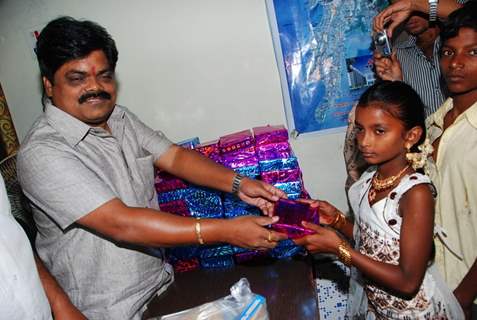 Shankar Nangre distributing Sweets and Fire Crackers to the underprivileged children