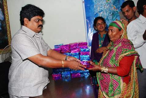 Shankar Nangre distributing Sweets and Fire Crackers to the underprivileged children