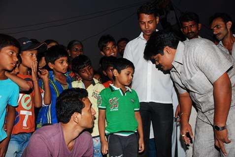 Shankar Nangre distributing Sweets and Fire Crackers to the underprivileged children