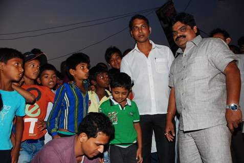 Shankar Nangre distributing Sweets and Fire Crackers to the underprivileged children