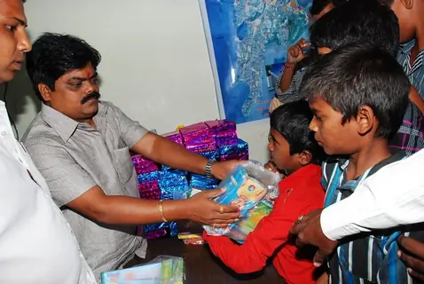 Shankar Nangre distributing Sweets and Fire Crackers to the underprivileged children