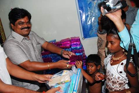 Shankar Nangre distributing Sweets and Fire Crackers to the underprivileged children