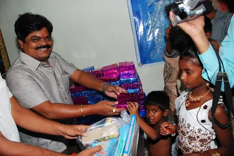 Shankar Nangre distributing Sweets and Fire Crackers to the underprivileged children