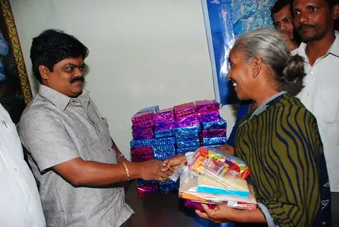 Shankar Nangre distributing Sweets and Fire Crackers to the underprivileged children
