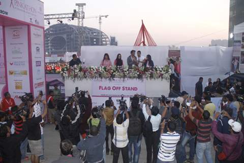 (L to R) Devika Bhojwani, bollywood actors Karisma Kapoor and Milind Soman at the first edition of Pinkathon International 10k women's run for breast cancer awareness at Bandra Kurla Complex in Mumbai.