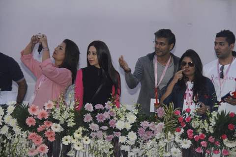 (L to R) Devika Bhojwani, bollywood actors Karisma Kapoor and Milind Soman at the first edition of Pinkathon International 10k women's run for breast cancer awareness at Bandra Kurla Complex in Mumbai.