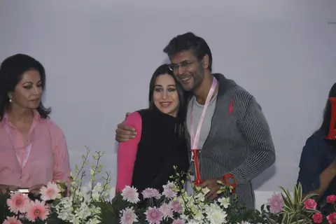 (L to R) Devika Bhojwani, bollywood actors Karisma Kapoor and Milind Soman at the first edition of Pinkathon International 10k women's run for breast cancer awareness at Bandra Kurla Complex in Mumbai.