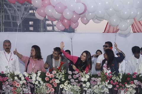 (L to R) Devika Bhojwani, bollywood actors Karisma Kapoor and Milind Soman at the first edition of Pinkathon International 10k women's run for breast cancer awareness at Bandra Kurla Complex in Mumbai.