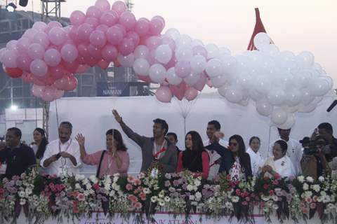 (L to R) Devika Bhojwani, bollywood actors Karisma Kapoor and Milind Soman at the first edition of Pinkathon International 10k women's run for breast cancer awareness at Bandra Kurla Complex in Mumbai.