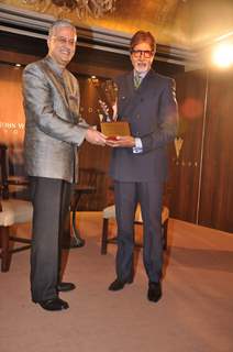 Chief Operating Officer Diageo plc Ivan Menezes honours bollywood actor Amitabh Bachchan as the 'John Walker & Sons Game Changer of the Century' at Hotel Taj Mahal Palace in Colaba, Mumbai.