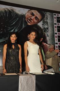 Bollywood actresses Pooja Kumar and Andrea Jeremiah at the film Vishwaroop press meet at Hotel JW Marriott in Juhu, Mumbai.