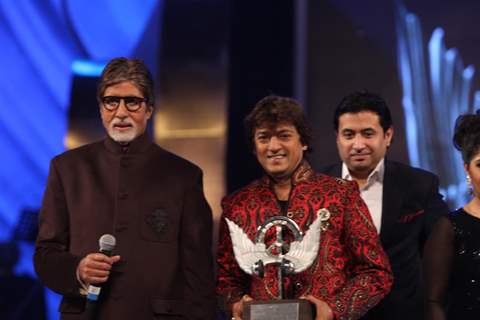 Amitabh Bachchan performs at the Global Sounds Of Peace Concert