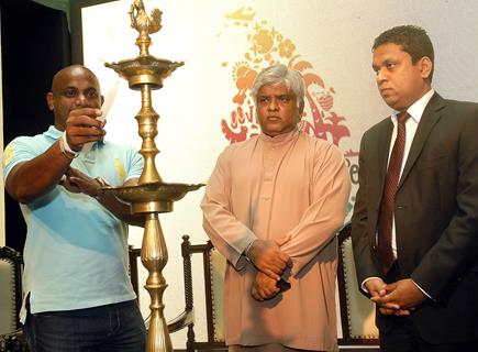 Sri Lankan Former Cricketers Sanath Jayasuriya and Arjuna Ranathunga lighting the lamp to inaugurate  GET  SRI LANKAN ED  at Garuda Mall , in Bangalore on Friday  22nd of February 2013   photo by IANS.