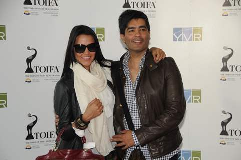 Neha Dhupia with Manish Malhotra arrive in Vancouver for TOIFA