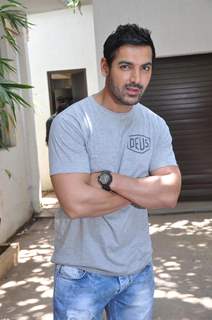 John Abraham gifts his favourite bike to director Sanjay Gupta