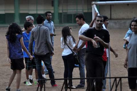 Aamir Khan playing football with his family