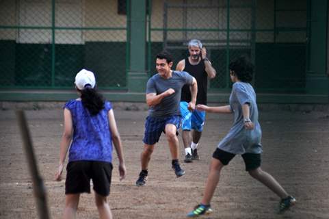 Aamir Khan playing football with his family