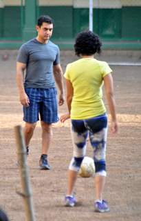 Aamir Khan playing football with his family