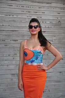 Jacqueline Fernandez poses for the photographers during the unveiling of new HTC One smart phone in Mumbai