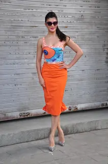 Jacqueline Fernandez poses for the photographers during the unveiling of new HTC One smart phone in Mumbai