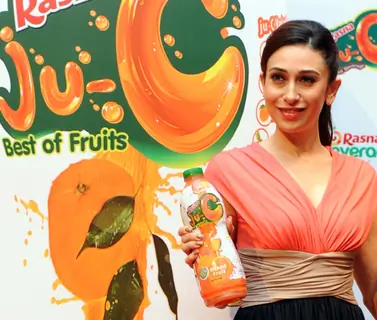 Rasna girl Avan Khambatta and Karisma Kapoor during the launch of 'Rasna-Ju-C'